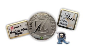 The round Cloisonné pin was designed exclusively for The Marina Inn by Tag UR It! Inc.! The custom Mathnasium "Multiplication Master" pin was also custom designed by our talented Graphics Tag Team!